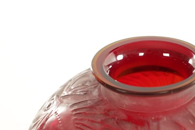 Lot 35 - A RENE LALIQUE CASE CHERRY RED AND AMBER GLASS 'POISSONS' GLOBULAR VASE
