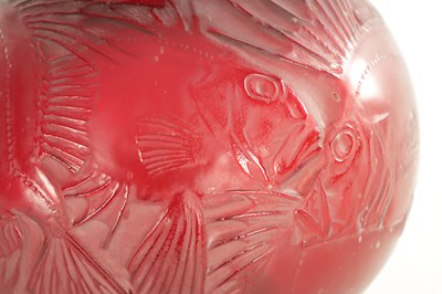 Lot 35 - A RENE LALIQUE CASE CHERRY RED AND AMBER GLASS 'POISSONS' GLOBULAR VASE