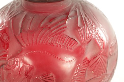 Lot 35 - A RENE LALIQUE CASE CHERRY RED AND AMBER GLASS 'POISSONS' GLOBULAR VASE
