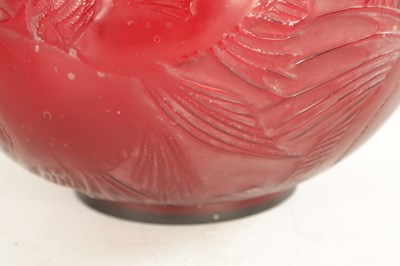 Lot 35 - A RENE LALIQUE CASE CHERRY RED AND AMBER GLASS 'POISSONS' GLOBULAR VASE