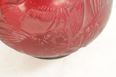 Lot 35 - A RENE LALIQUE CASE CHERRY RED AND AMBER GLASS 'POISSONS' GLOBULAR VASE