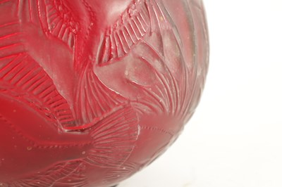 Lot 35 - A RENE LALIQUE CASE CHERRY RED AND AMBER GLASS 'POISSONS' GLOBULAR VASE