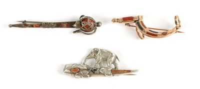 Lot 319 - A COLLECTION OF THREE SCOTTISH PEBBLE BROOCHES