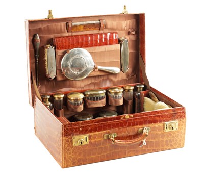 Lot 451 - MAPPIN AND WEBB, OXFORD STREET, LONDON. A FINE LATE 19TH CENTURY CROCODILE SKIN FULLY FITTED SILVER TOPPED DRESSING CASE
