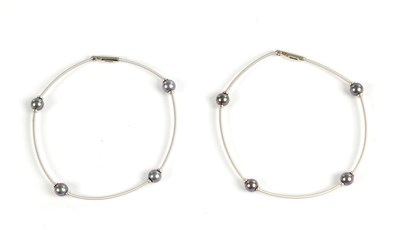 Lot 312 - A PAIR OF MAPPIN & WEBB 18CT WHITE GOLD AND PEARL BRACELETS