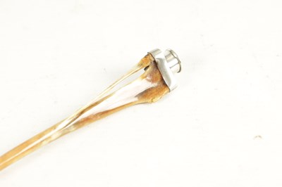 Lot 327 - A GEORGE V SILVER MOUNTED HARE BONE CIGARETTE/CIGAR HOLDER