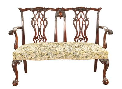 Lot 1267 - A 19TH CENTURY CARVED MAHOGANY CHIPPENDALE STYLE TWO SEATER SETTEE