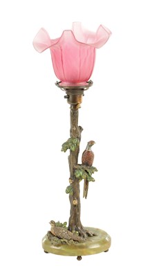 Lot 640 - AN ART NOUVEAU AUSTRIAN COLD PAINTED BRONZE TABLE LAMP AND SHADE