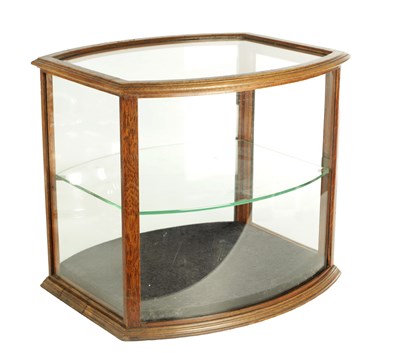Lot 1297 - AN UNUSUAL LATE 19TH CENTURY OAK FRAME-SIDED STANDING GLAZED DISPLAY CASE