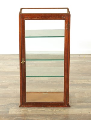 Lot 1338 - A LATE 19TH CENTURY FREESTANDING MAHOGANY GLAZED DISPLAY CASE