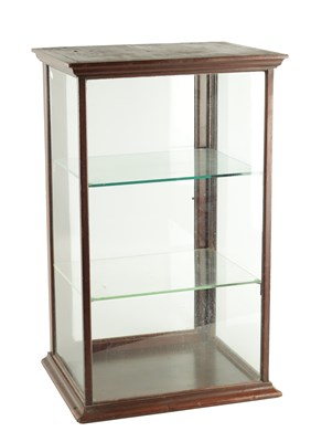 Lot 1345 - A LATE 19TH CENTURY FREESTANDING GLAZED MAHOGANY DISPLAY CASE