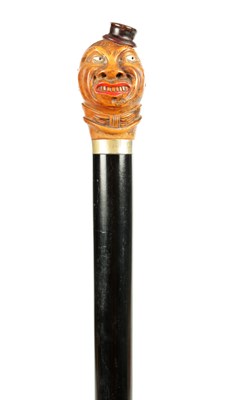 Lot 507 - A LATE 19TH CENTURY CARVED BOX WOOD CARICATURE HEAD WALKING STICK