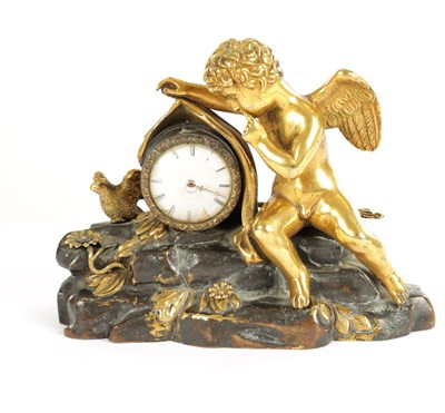 Lot 970 - A REGENCY ENGLISH BRONZE AND GILT BRONZE SMALL MANTEL CLOCK