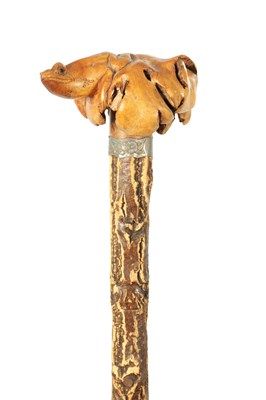 Lot 490 - AN UNUSUAL 20TH CENTURY LARGE CARVED ROOT WOOD AND CORK WALKING STICK
