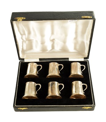Lot 454 - A CASED SET OF 6 STERLING SILVER SPIRIT MUGS