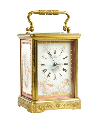 Lot 1033 - MARGAINE PARIS NUMBER 6321. A LATE 19TH CENTURY ENGRAVED BRASS STRIKING PORCELAIN PANELLED CARRIAGE CLOCK