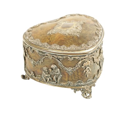 Lot 438 - A 19TH CENTURY SILVER AND TORTOISESHELL HEART SHAPED JEWELLERY BOX