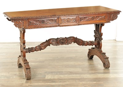 Lot 1218 - A 19TH CENTURY ANGLO INDIAN CARVED HARDWOOD LIBRARY TABLE