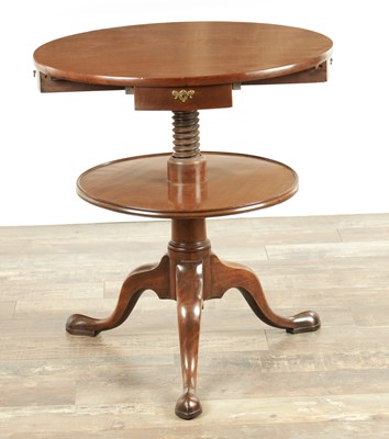Lot 1309 - A RARE GEORGE II FIGURED MAHOGANY TWO-TIER REVOLVING TABLE