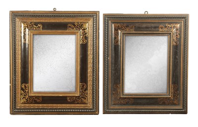 Lot 1222 - A MATCHED PAIR OF 18TH CENTURY CONTINENTAL EBONISED AND GILT PAINTED HANGING MIRRORS
