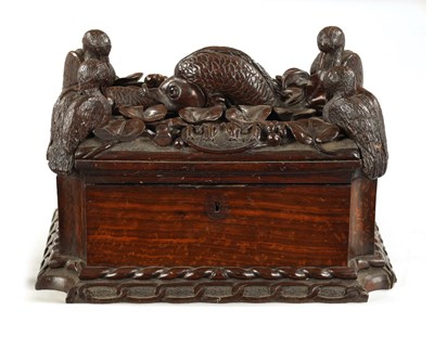 Lot 958 - AN IMPRESSIVE 18TH CENTURY CONTINENTAL CARVED HARDWOOD TABLE CASKET