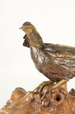 Lot 282 - A LATE 19TH CENTURY JAPANESE MEIJI PERIOD GILT AND POLYCHROME BRONZE OKIMONO / PHEASANT SCULPTURE