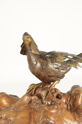 Lot 282 - A LATE 19TH CENTURY JAPANESE MEIJI PERIOD GILT AND POLYCHROME BRONZE OKIMONO / PHEASANT SCULPTURE