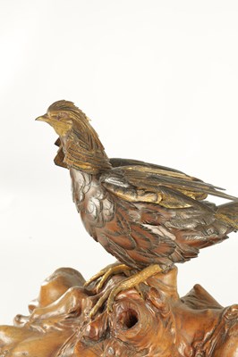 Lot 282 - A LATE 19TH CENTURY JAPANESE MEIJI PERIOD GILT AND POLYCHROME BRONZE OKIMONO / PHEASANT SCULPTURE