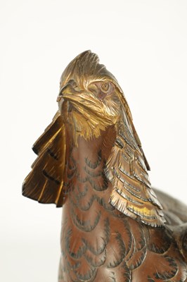Lot 282 - A LATE 19TH CENTURY JAPANESE MEIJI PERIOD GILT AND POLYCHROME BRONZE OKIMONO / PHEASANT SCULPTURE