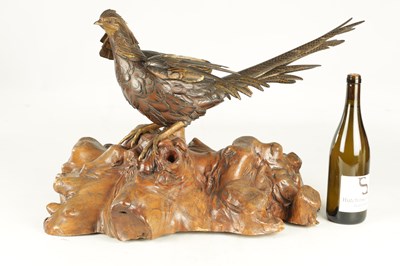 Lot 282 - A LATE 19TH CENTURY JAPANESE MEIJI PERIOD GILT AND POLYCHROME BRONZE OKIMONO / PHEASANT SCULPTURE