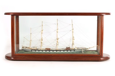 Lot 703 - A 19TH CENTURY SAILOR MADE CASED MODEL OF A FOUR MASTED SCHOONER SHIP
