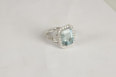 Lot 325 - A LADIES' 18CT WHITE GOLD AQUAMARINE AND DIAMOND RING