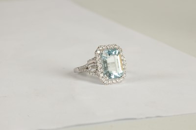 Lot 325 - A LADIES' 18CT WHITE GOLD AQUAMARINE AND DIAMOND RING