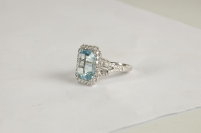 Lot 325 - A LADIES' 18CT WHITE GOLD AQUAMARINE AND DIAMOND RING