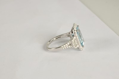 Lot 325 - A LADIES' 18CT WHITE GOLD AQUAMARINE AND DIAMOND RING