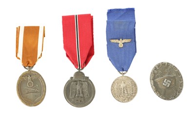 Lot 668 - A COLLECTION OF FOUR WWII GERMAN NAZI MEDALS
