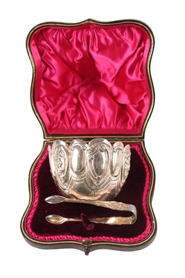 Lot 295 - A LATE 19TH CENTURY CASED SILVER SUGAR BASKET SET