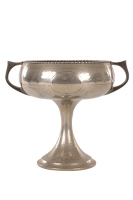 Lot 893 - AN ARTS AND CRAFTS PEWTER TWO HANDLED FOOTED BOWL