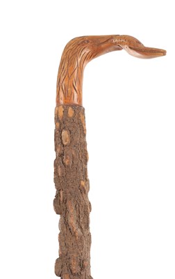 Lot 627 - A LATE 19TH CENTURY FOLK ART CARVED WALKING STICK