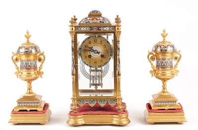 Lot 1510 - A LATE 19TH CENTURY FRENCH ORMOLU AND CHAMPLEVE ENAMEL CLOCK GARNITURE