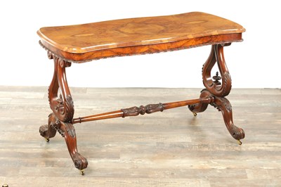 Lot 1173 - A VICTORIAN BURR WALNUT SERPENTINE SHAPED LIBRARY TABLE