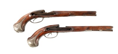 Lot 667 - A PAIR OF 18TH CENTURY WALNUT PISTOL STOCKS