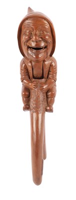 Lot 1150 - A LATE 19TH CENTURY BLACK FOREST CARVED LINDEN WOOD NUT CRAKER