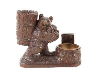 Lot 1092 - A 19TH CENTURY BLACK FOREST CARVED WALNUT MATCH HOLDER