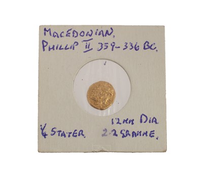 Lot 552 - A MACEDONIAN PHILLIP II 1/4 STATER GOLD COIN