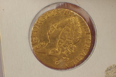 Lot 553 - A GEORGE II 1747 GOLD GUINEA