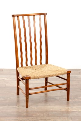 Lot 1228 - AN EARLY 20TH CENTURY ARTS AND CRAFTS LIBERTY STYLE STICK-BACK CHAIR