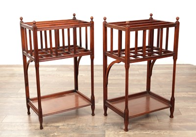 Lot 1207 - A PAIR OF ARTS AND CRAFTS MAHOGANY CANTERBURYS
