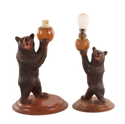 Lot 1144 - TWO 20TH CENTURY BLACK FOREST CARVED BEAR LINDEN WOOD TABLE LAMPS
