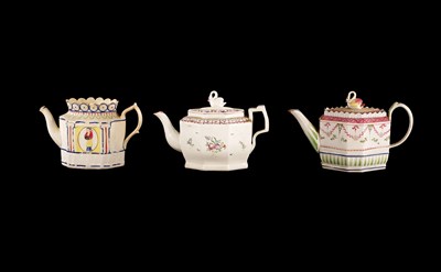 Lot 67 - THREE GEORGE III CREAMWARE STAFFORDSHIRE TEAPOTS